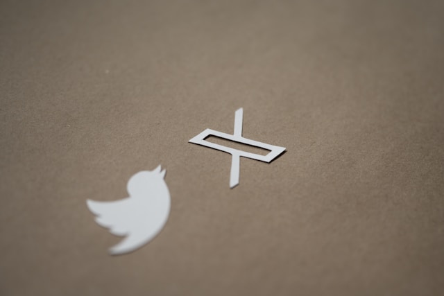 The old Twitter logo and the new X logo on a brown background.