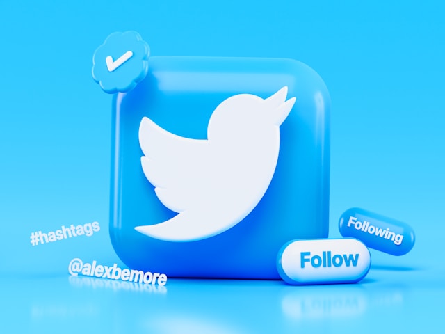 A blue square with a white Twitter bird logo.